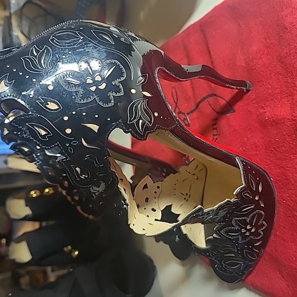 Christian Louboutin - Picture 1 of 8